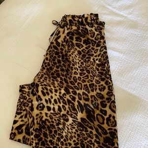 Cheetah print silk pants from Fashion Nova